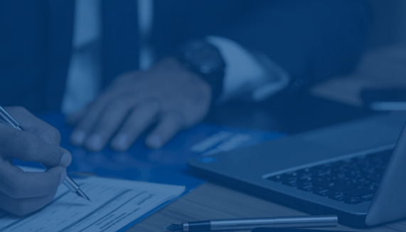 Man signing document